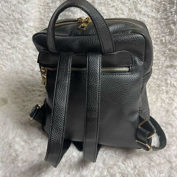 Steve Madden Black synthetic embossed small backpack gold tone hardwares. main image 15